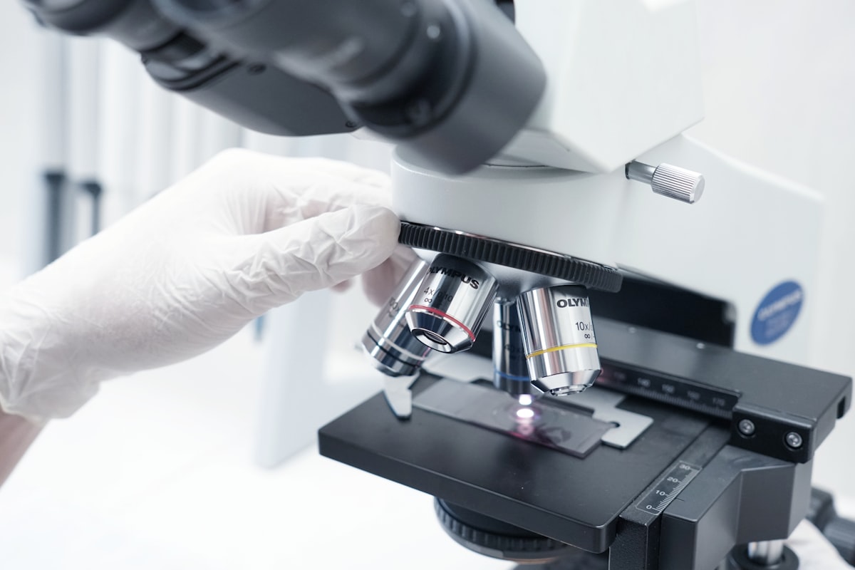 NAD precursor comparison - scientist examining samples in laboratory | Eternal Elixir Australia