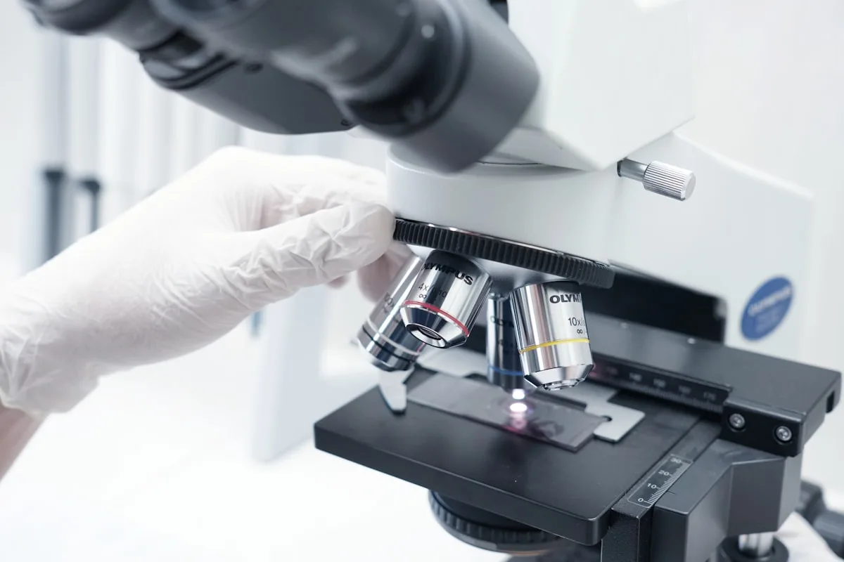 NAD precursor comparison - scientist examining samples in laboratory | Eternal Elixir Australia