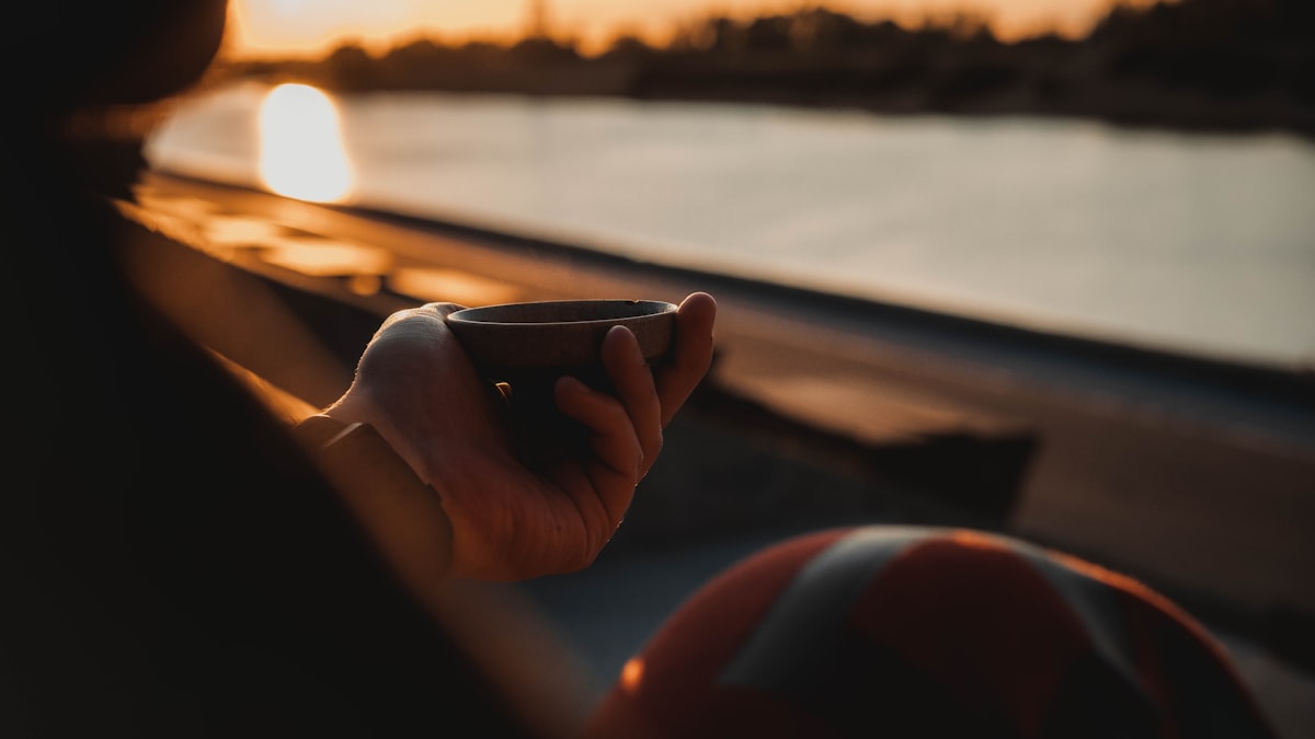 methylene blue and coffee - person holding coffee cup morning focus | Eternal Elixir Australia